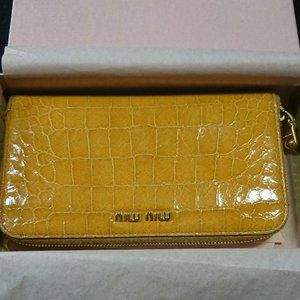 Miu Miu embossed leather zip around wallet